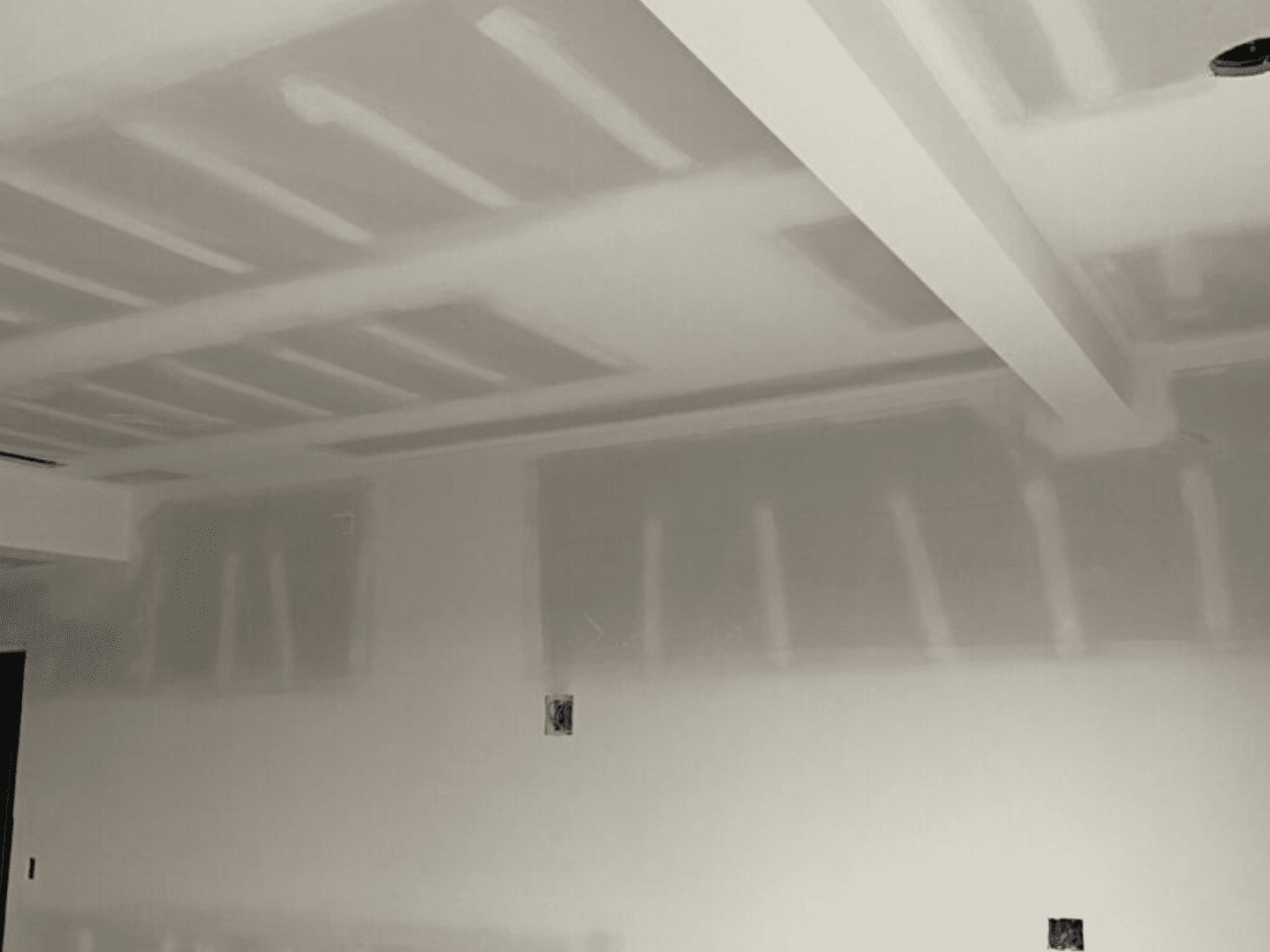 A room with many white walls and ceiling.