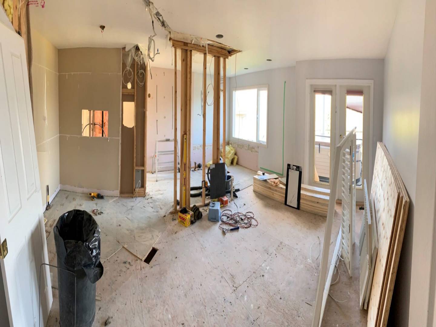 A room being remodeled with the walls in place.